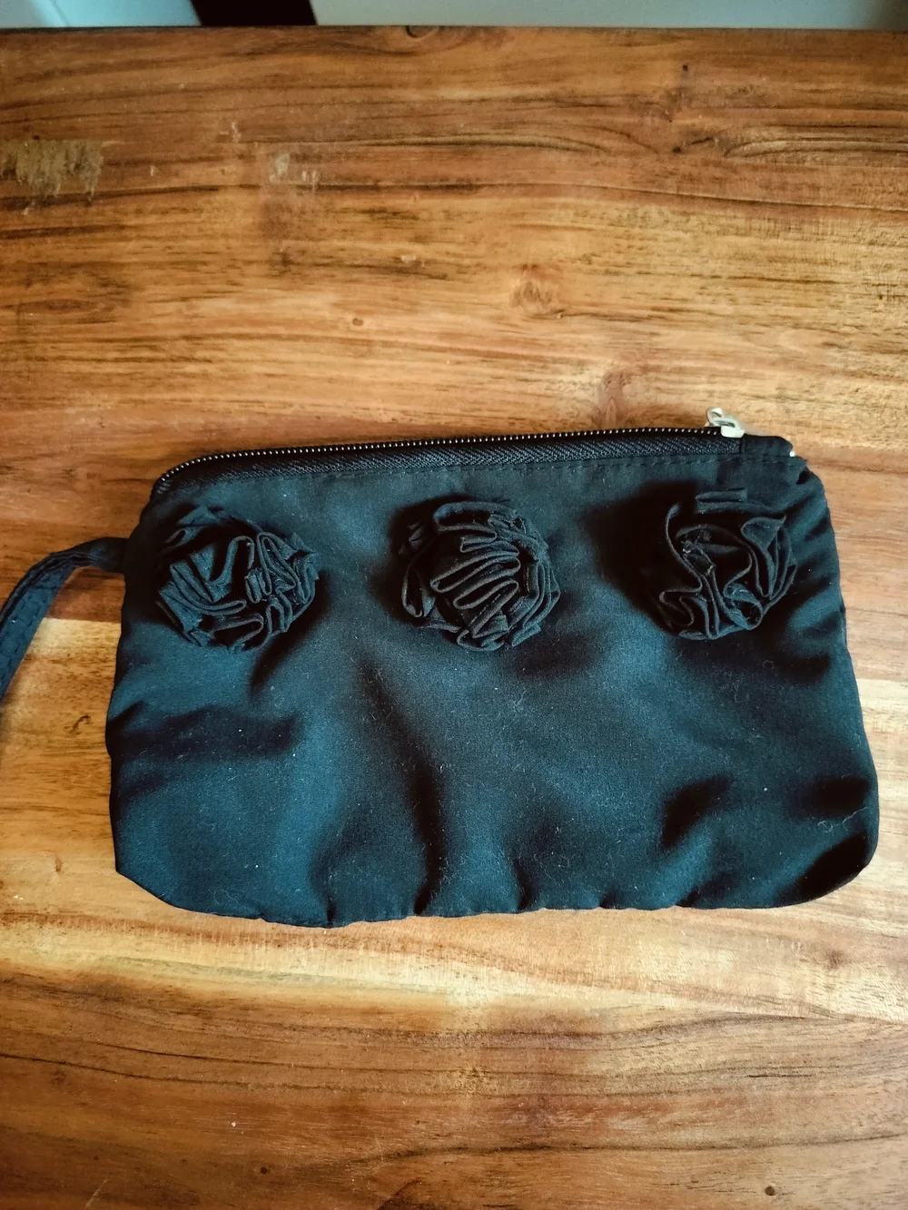 Black Women's Wristlet Pouch with Rosette Accents